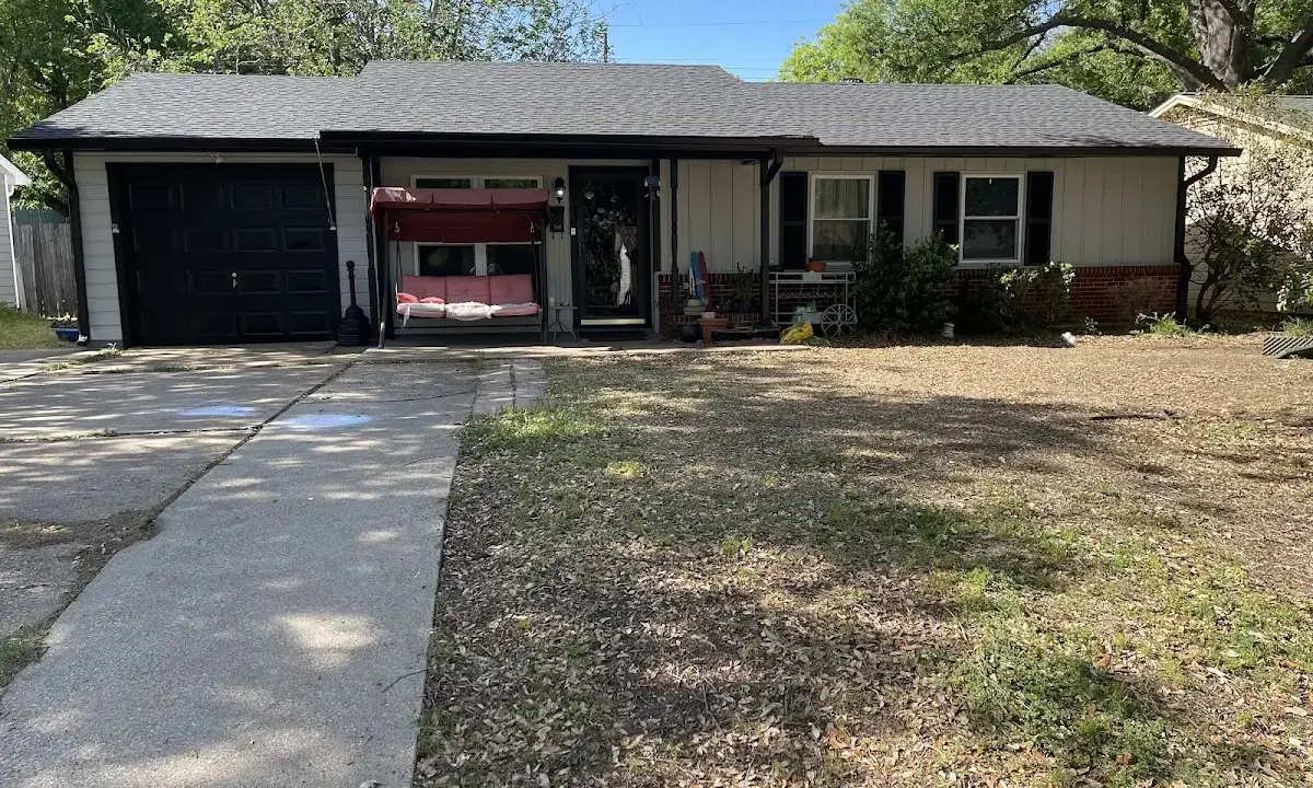 Asphalt Shingle Roof Repair crew at work on a residential roof in Decatur